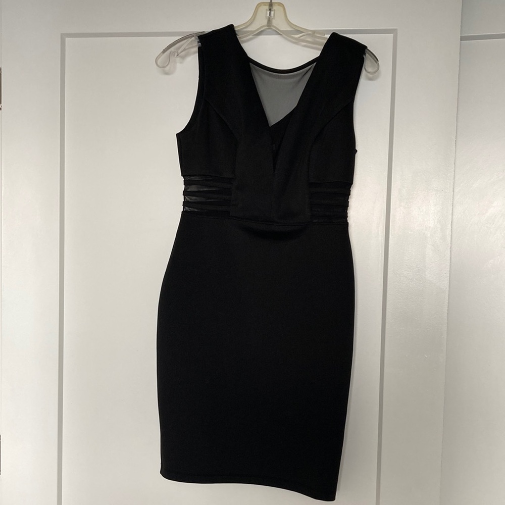 Sexy black dress with mesh cut outs, size 4